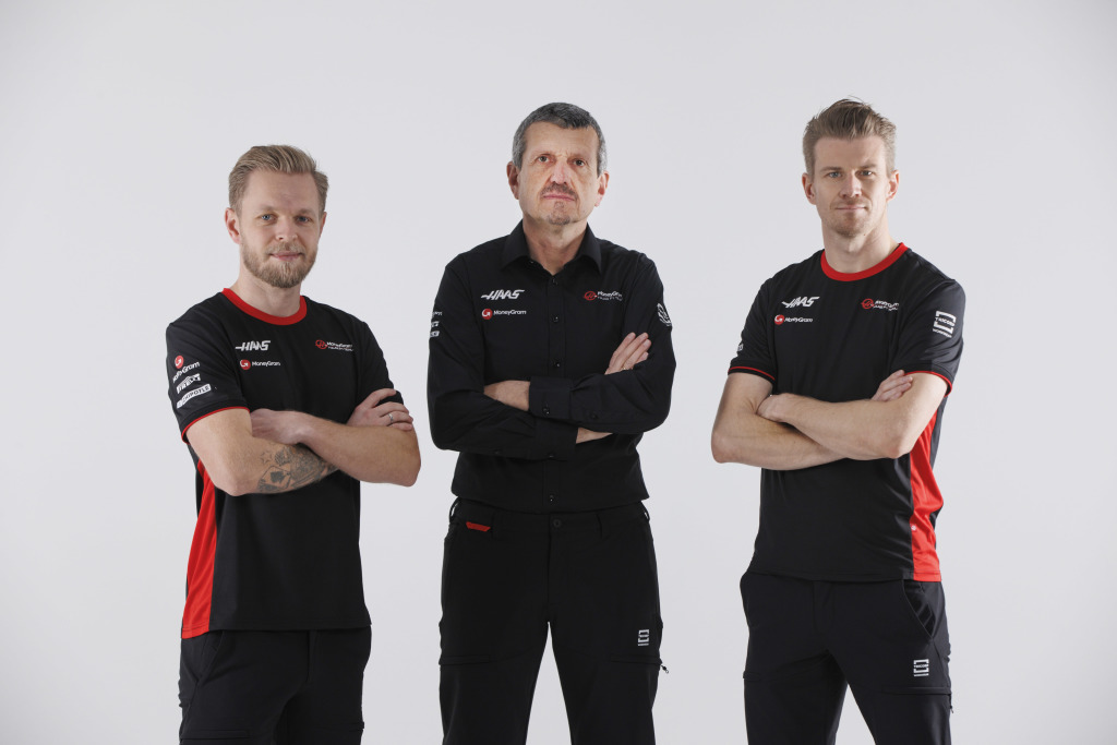 Kevin Magnussen, Guenther Steiner and Nico Hulkenberg